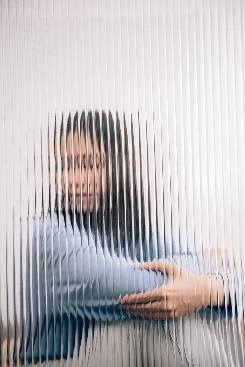 Woman Behind a Glass